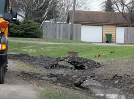 Snow pile by L & M better May 2 16.webp